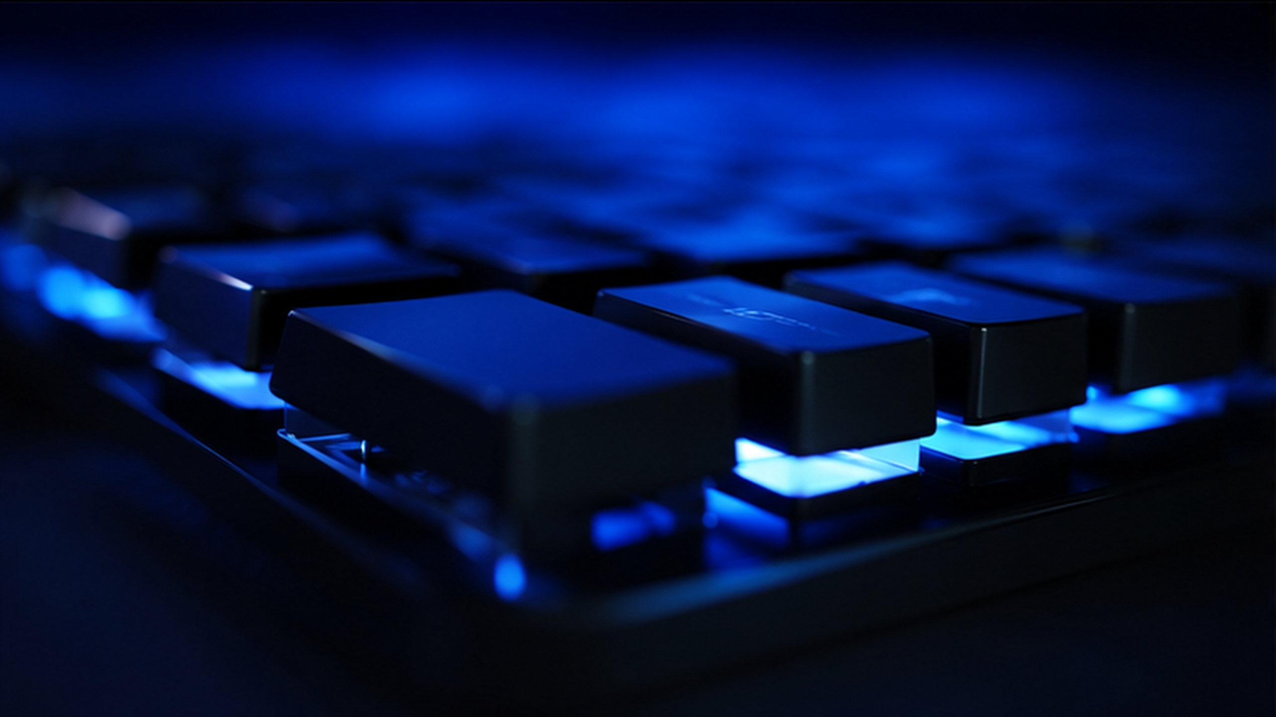 Blue-lit keyboard in a software workspace